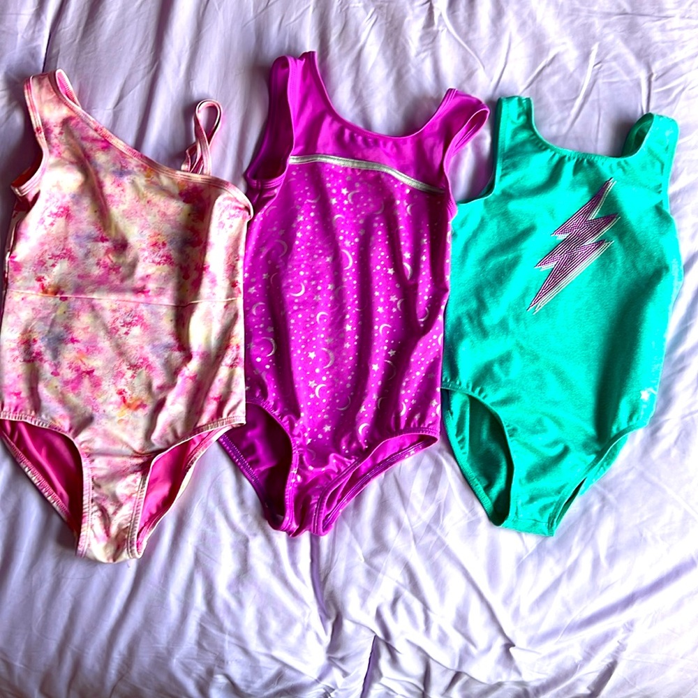 3-Girls gymnastics leotard, size medium.